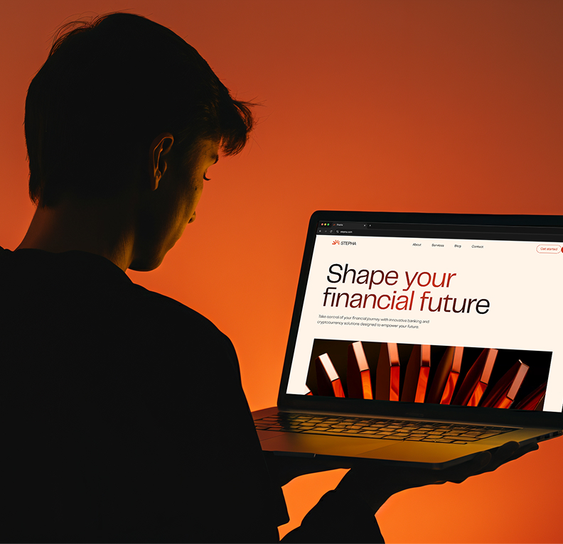 Photo of a man in a room using a tablet computer